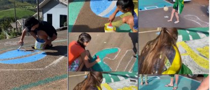 VÍDEO: vizinhos se reúnem e pintam rua para torcer pelo Brasil na Copa do Mundo 2026